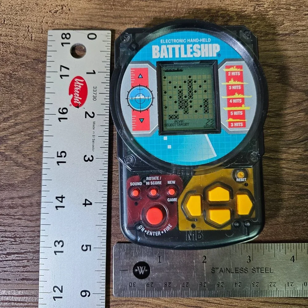 Vintage Battleship Electronic Handheld Game by Milton Bradley 1995.